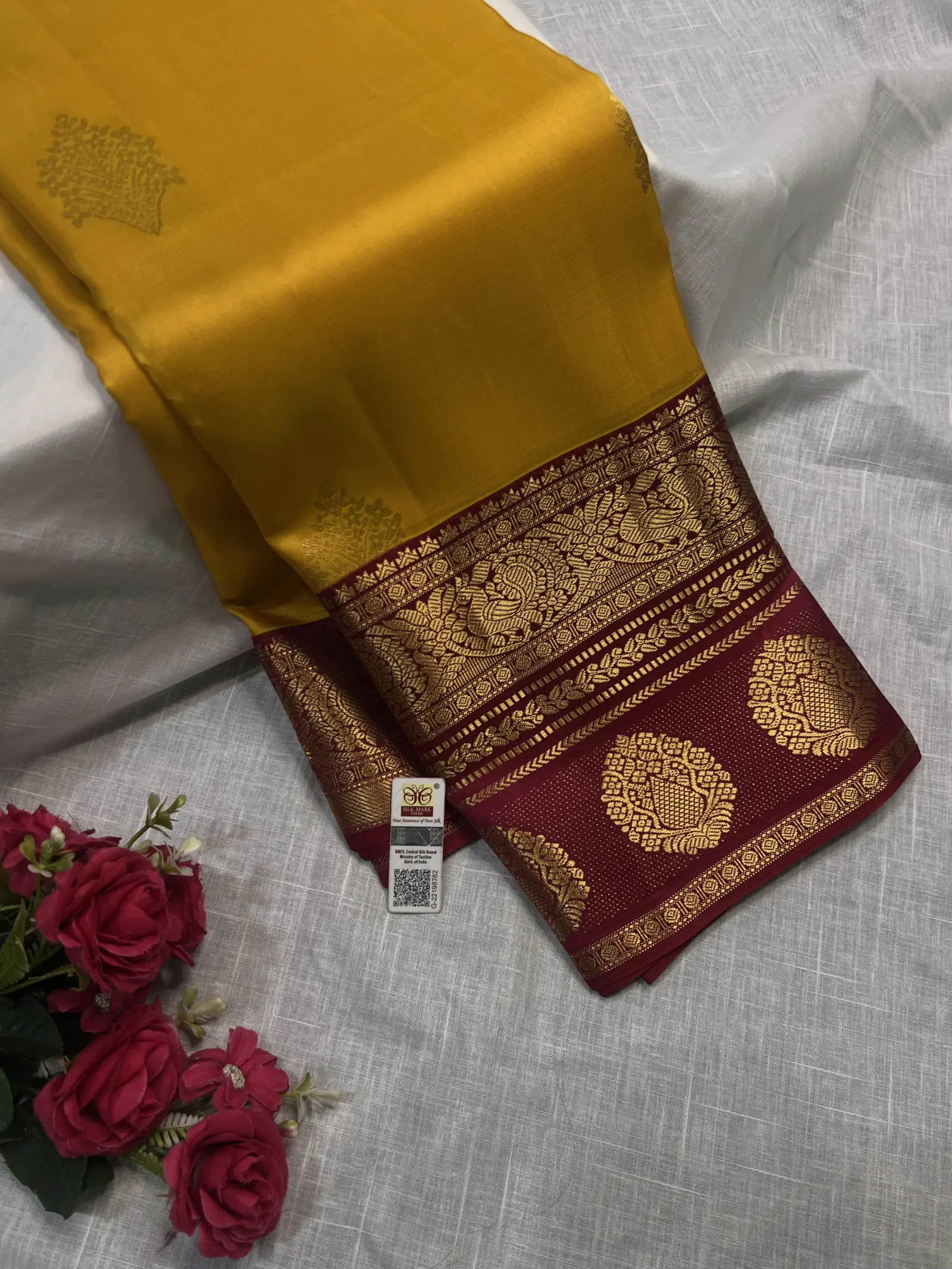 Mustard Saree with Gold Motifs and Maroon Border