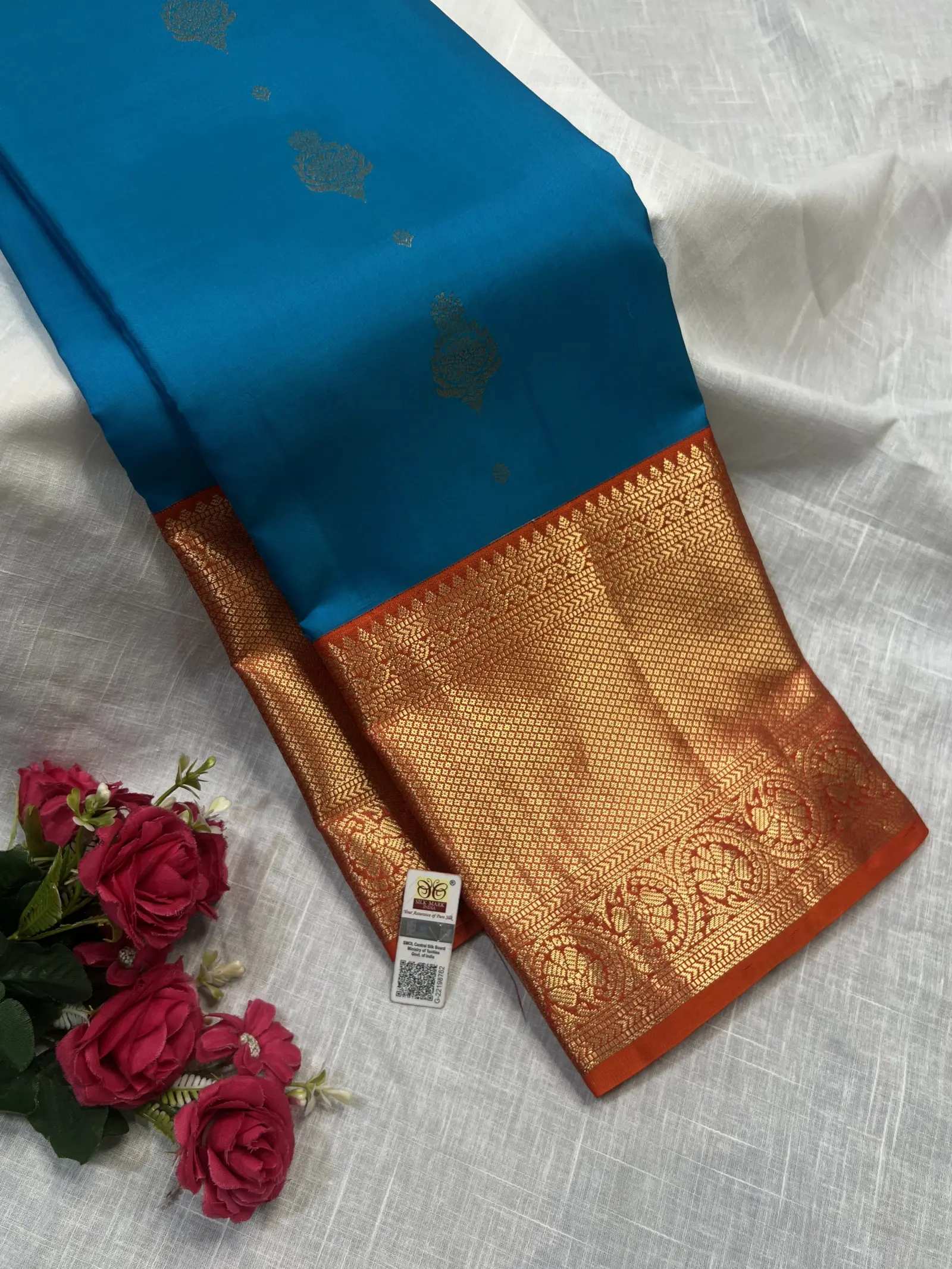Royal Blue Saree with Gold Motifs and Orange Edge