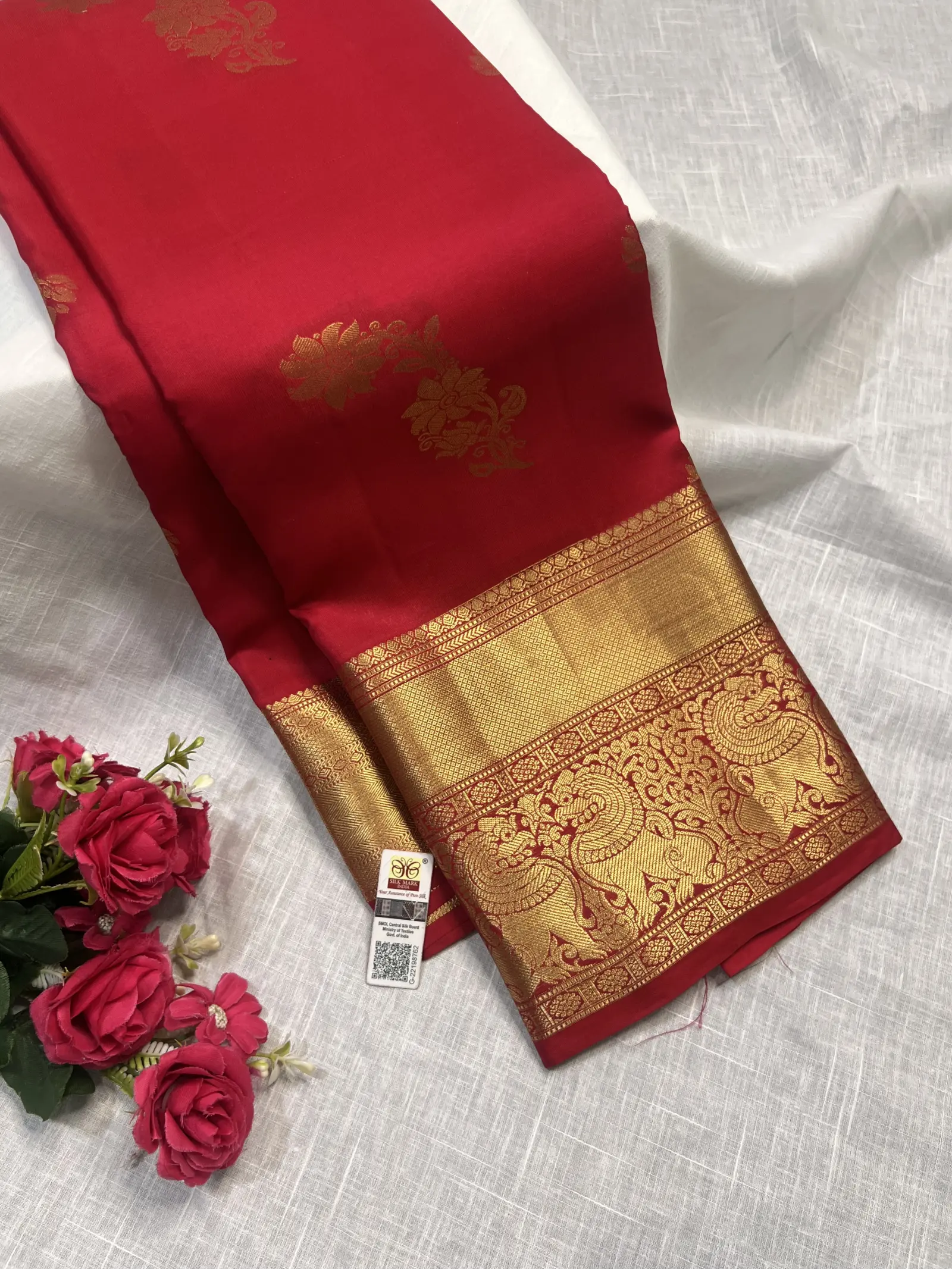 Red Saree with Gold Floral Motifs and Peacock Border