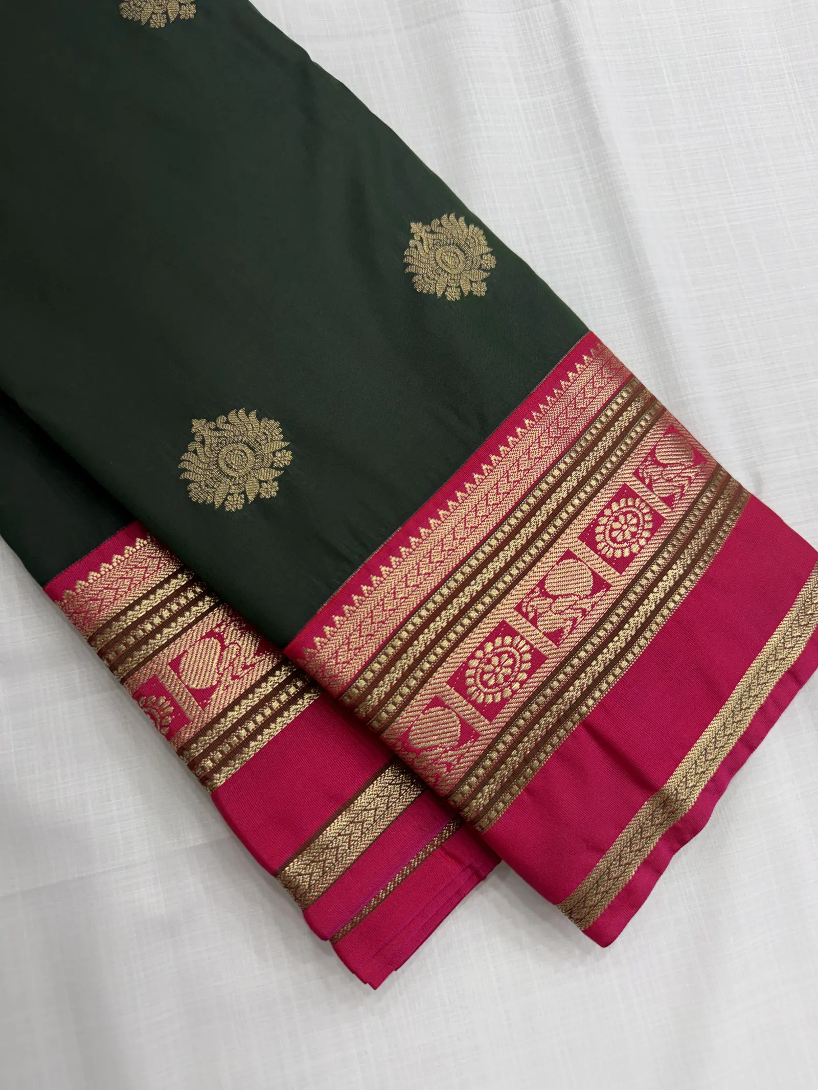 Green Saree with Pink Border and Gold Floral Motifs