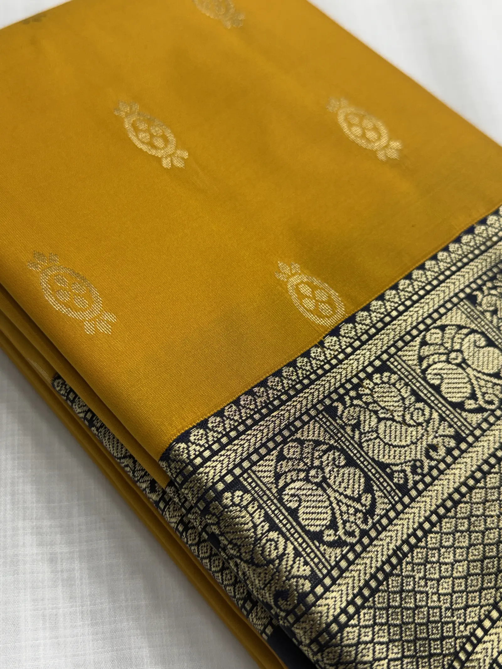 Yellow Saree with Navy Blue and Gold Woven Border