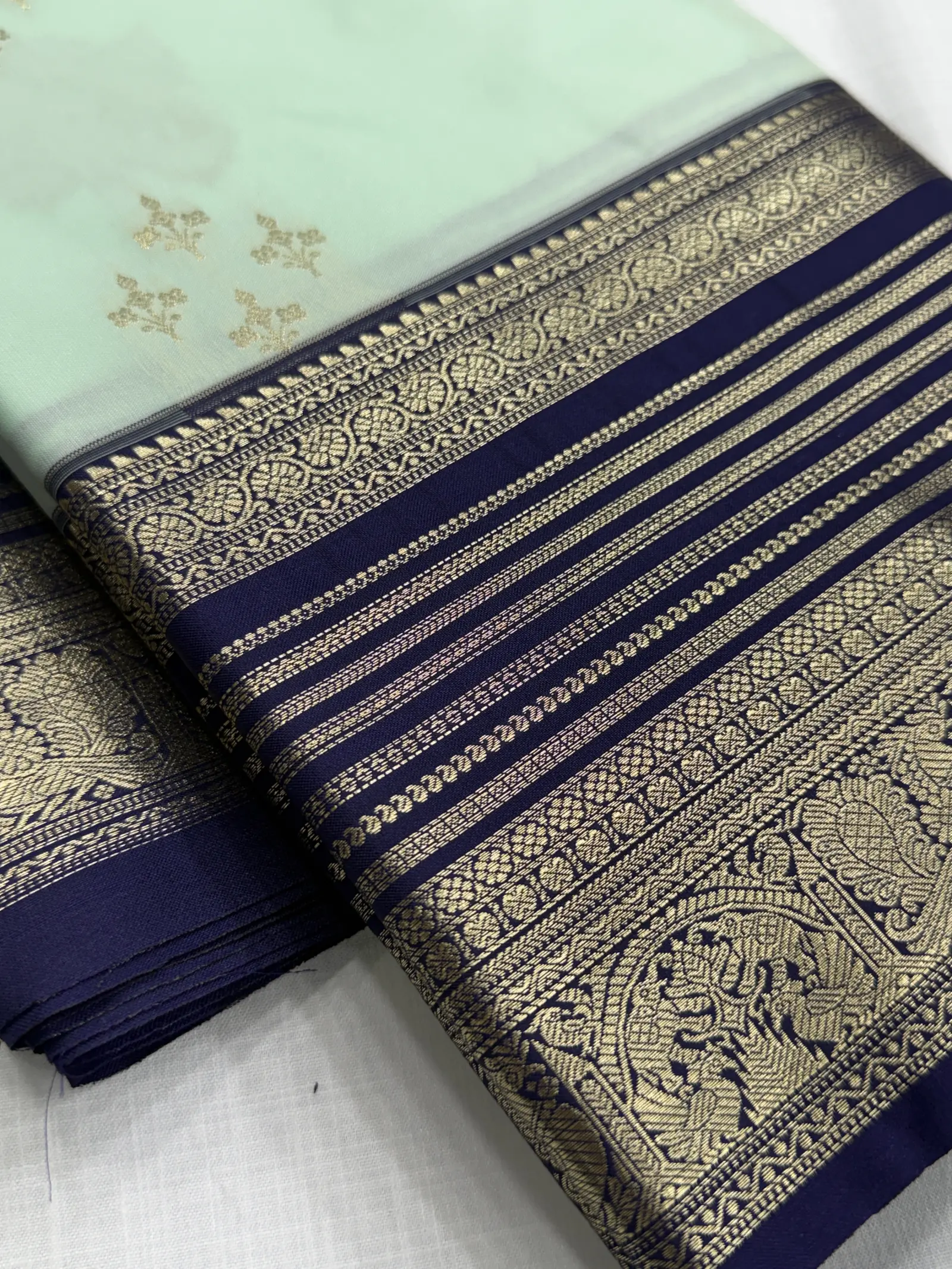 Mint Green Saree with Navy Blue and Gold Border