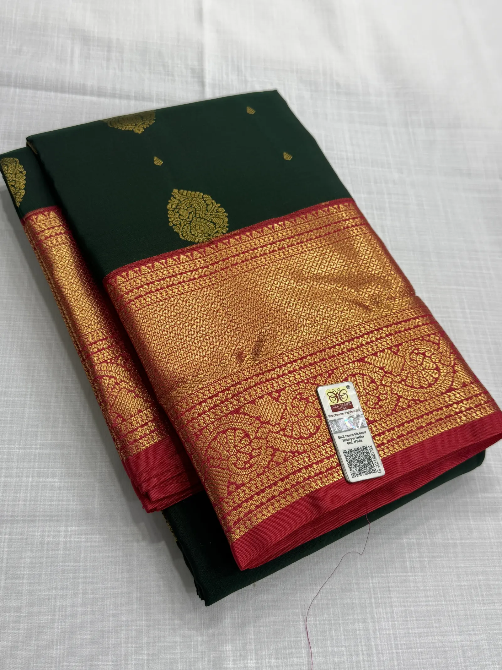 Bottle Green Saree with Gold Zari Weaving and Pink Border