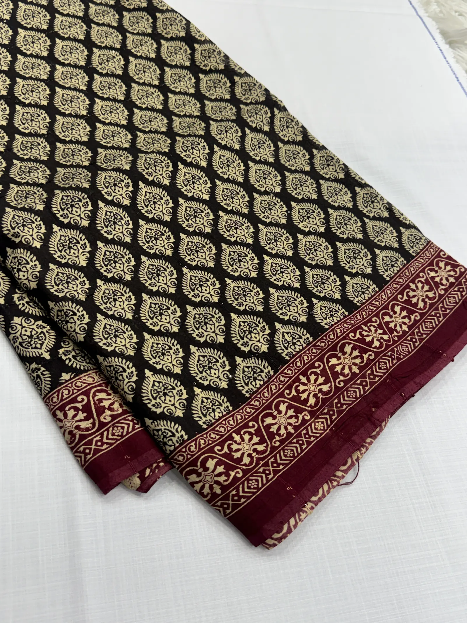 Cotton Saree in black with deep maroon Border