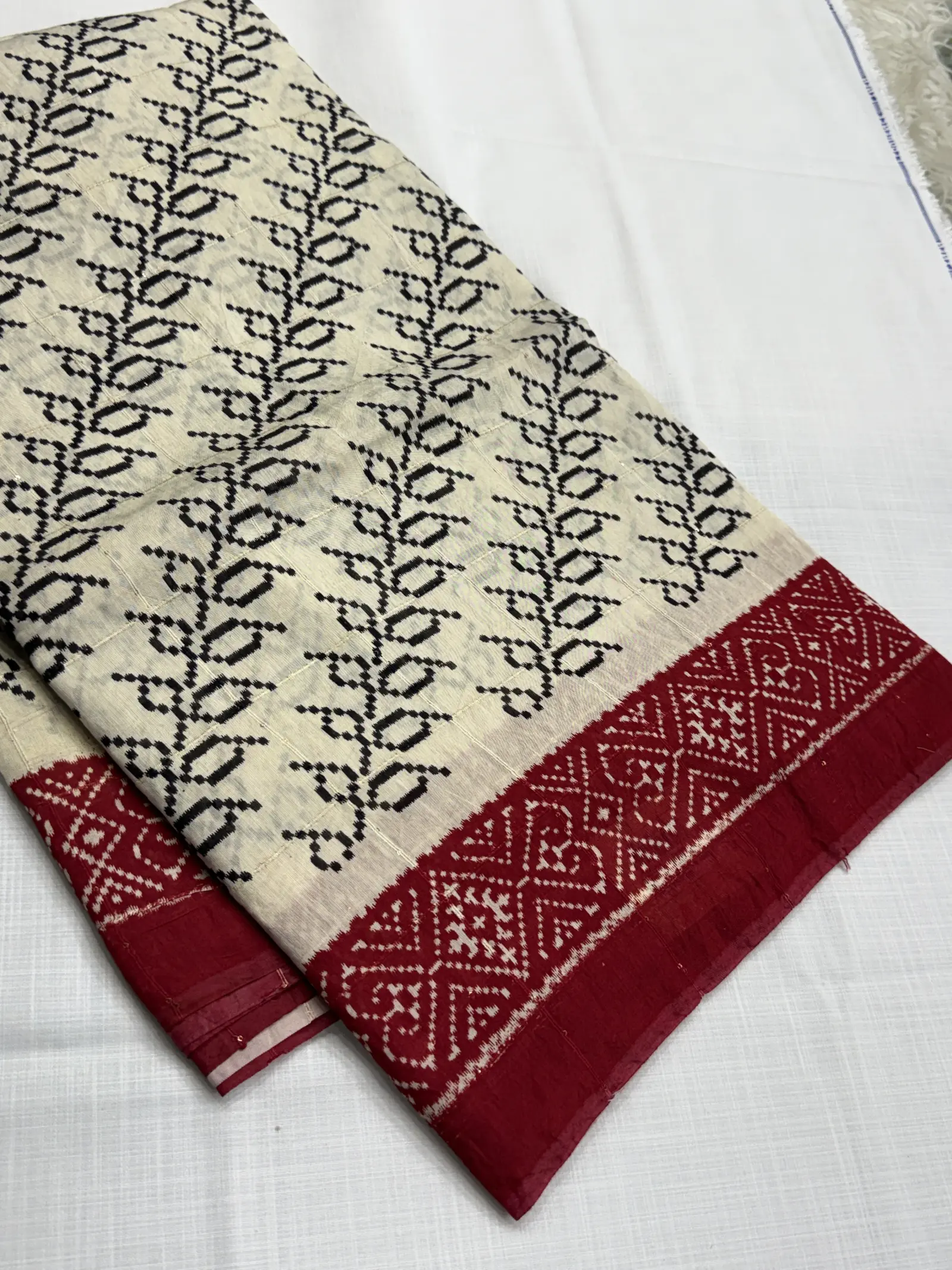 Cotton Saree in ivory with deep red Border