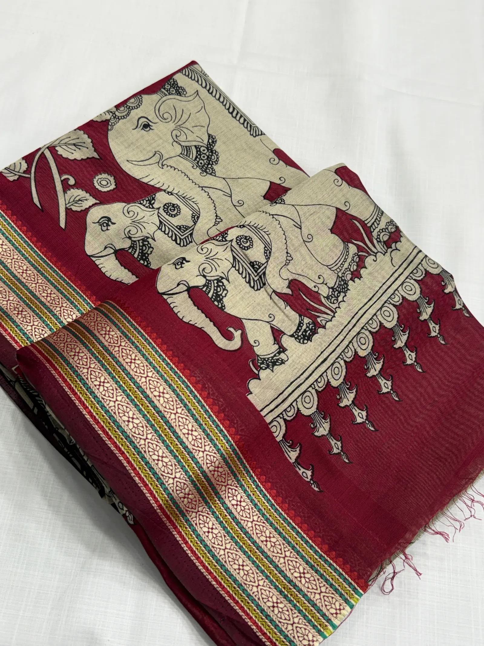 Cotton Saree in deep red with green and gold-toned Border