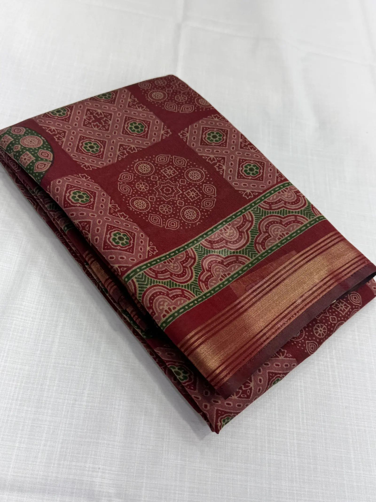 Wine red Cotton Saree with muted gold Border