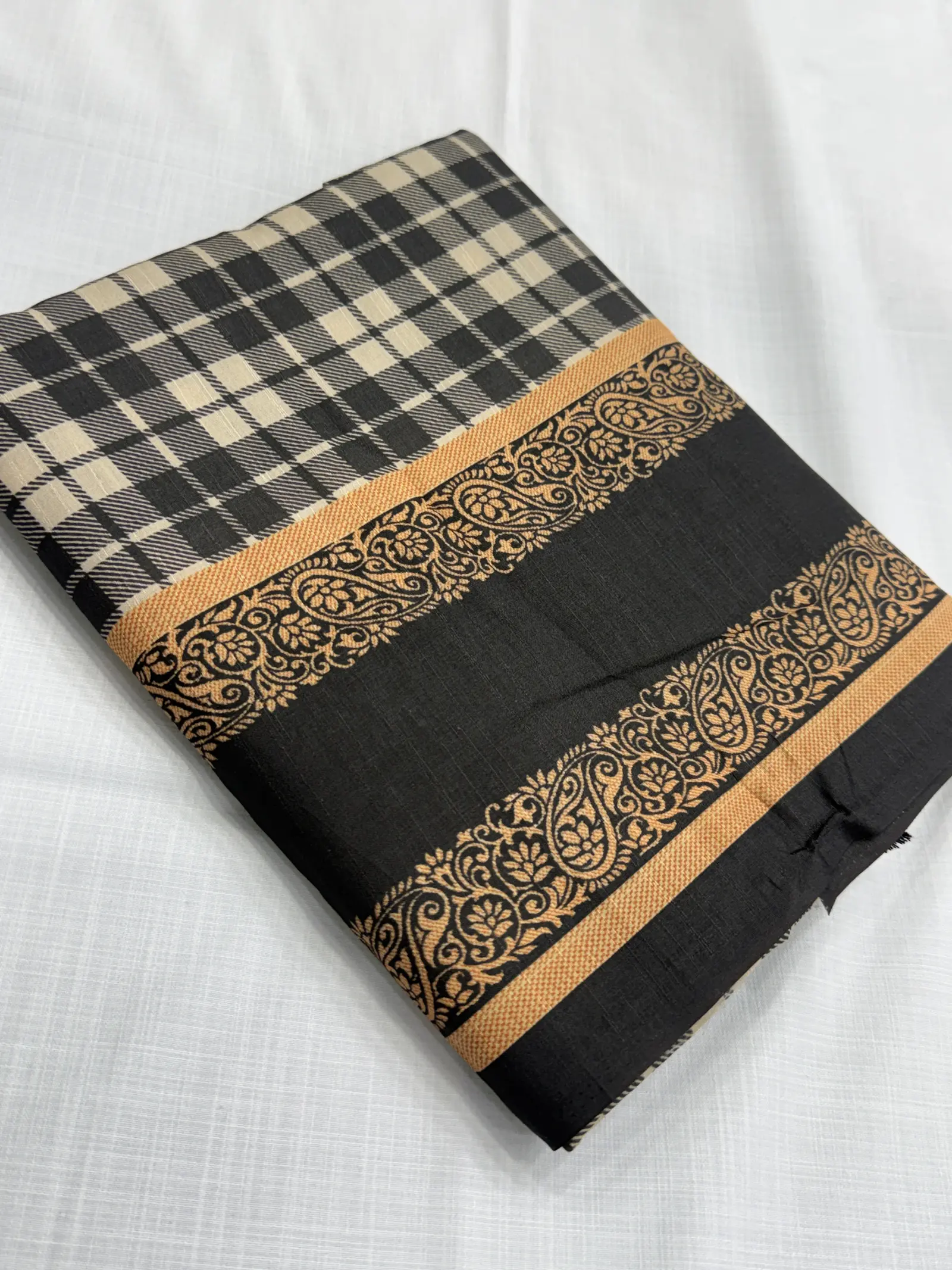 Cotton Saree in Black and beige with orange and gold-toned Border