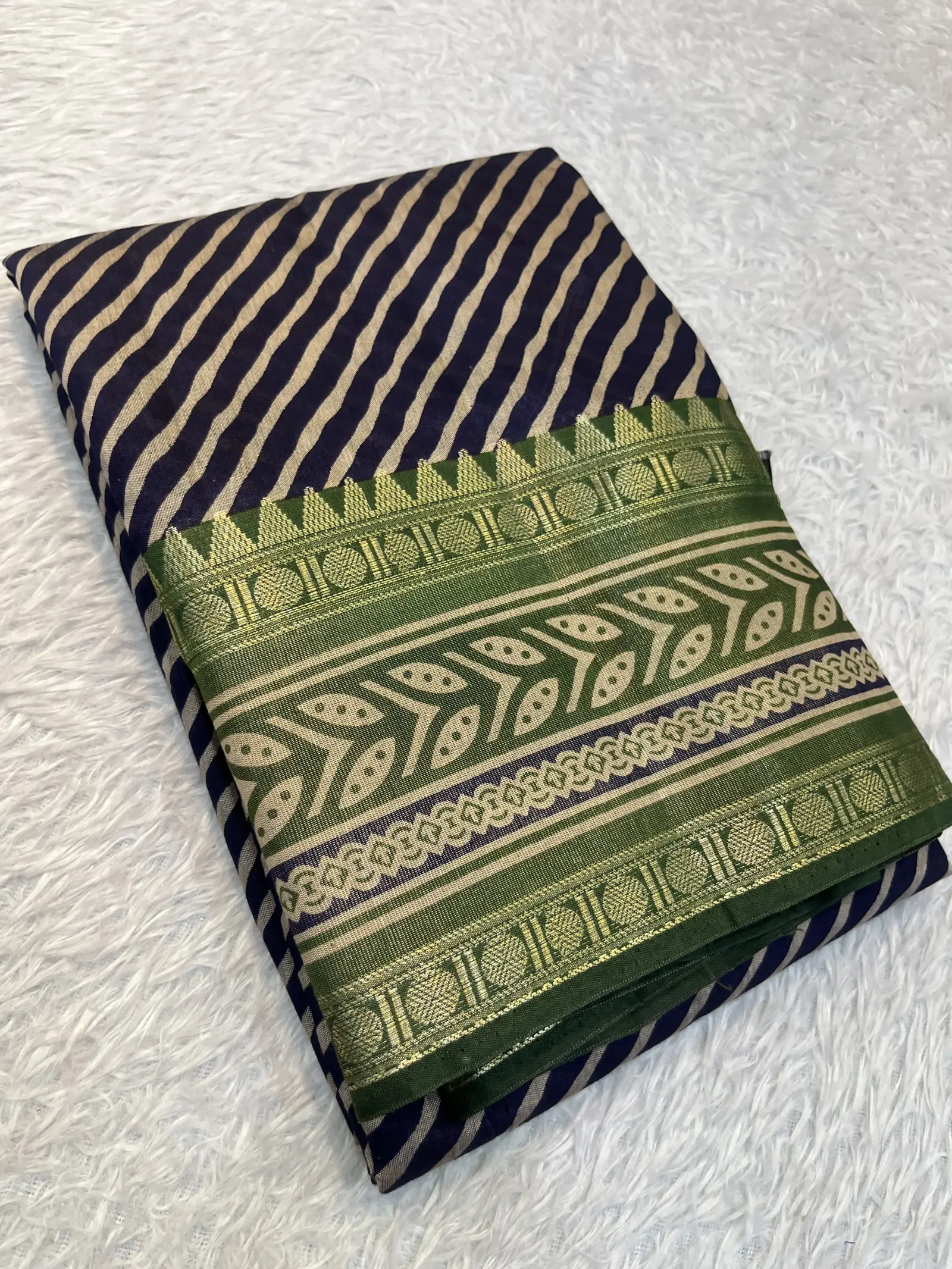 E1097397 – Navy Blue Cotton Mull Saree with Green Gold Border