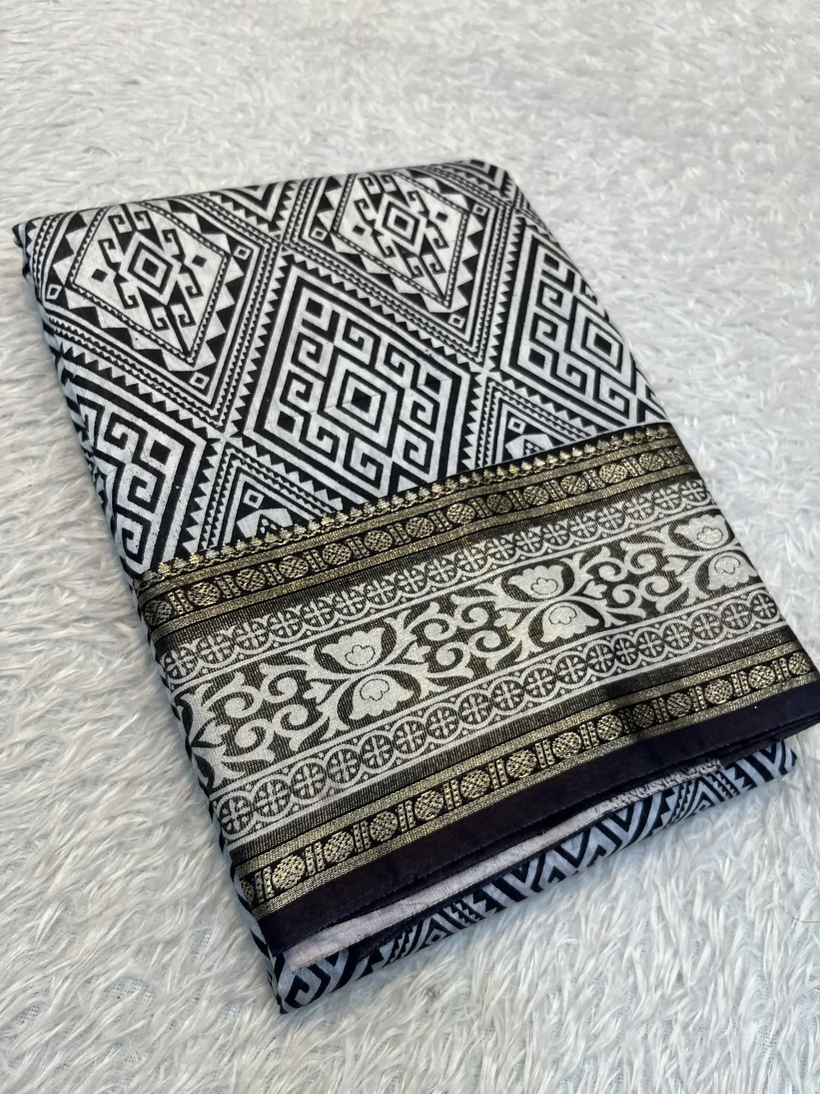 E1097395 – Off-White Cotton Saree with Black Geometric Design