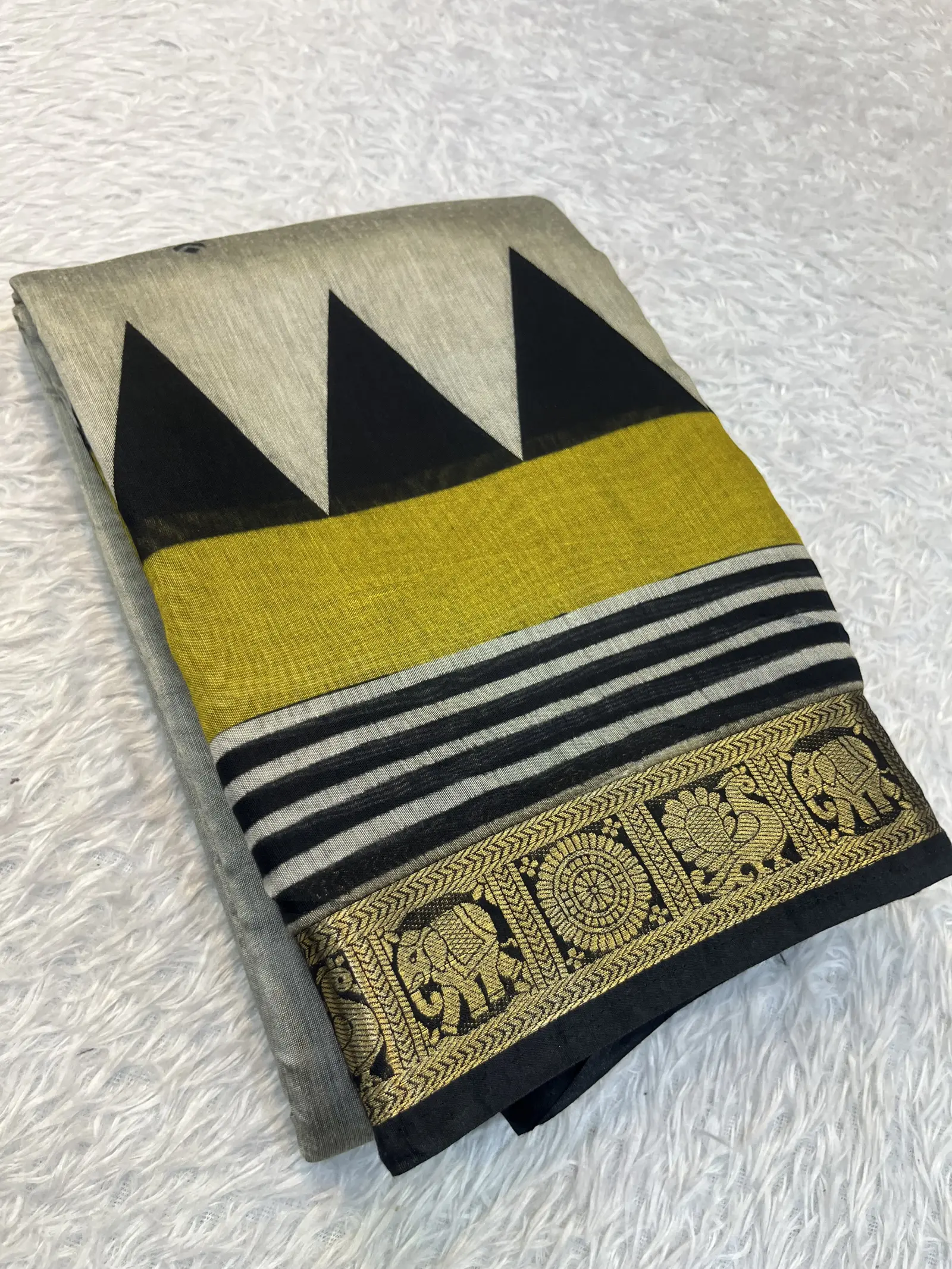 E1096115 – Off-White Cotton Saree with Elephant Peacock Border